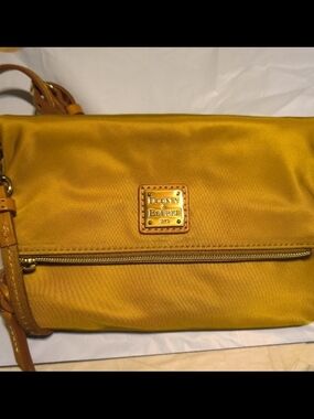 Dooney & Bourke Yellow Crossbody with Front Zip and Logo Plaque
